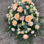 #### Peach and cream casket spray to include roses with seasonal flowers and foliage
   4ft  £165    5ft £225 (as shown)