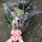 #### mixed flowers spray in cellophane      £45