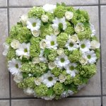 #### Green and white loose based round posy
  12