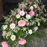 #### Pink and white casket spray to include roses with seasonal flowers and foliage
 4ft £165    5ft £195 (as shown)