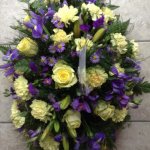 ####  yellow and purple casket spray to include roses and seasonal foliage     
 3ft £125 (as shown)  4ft £160   5ft £195