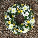 #### mixed open wreath  with seasonal flowers in any colours 
12